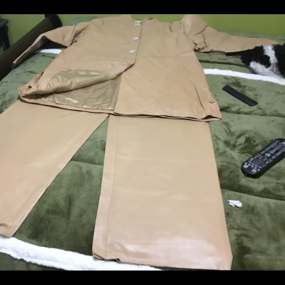 Tan leather pant suit.